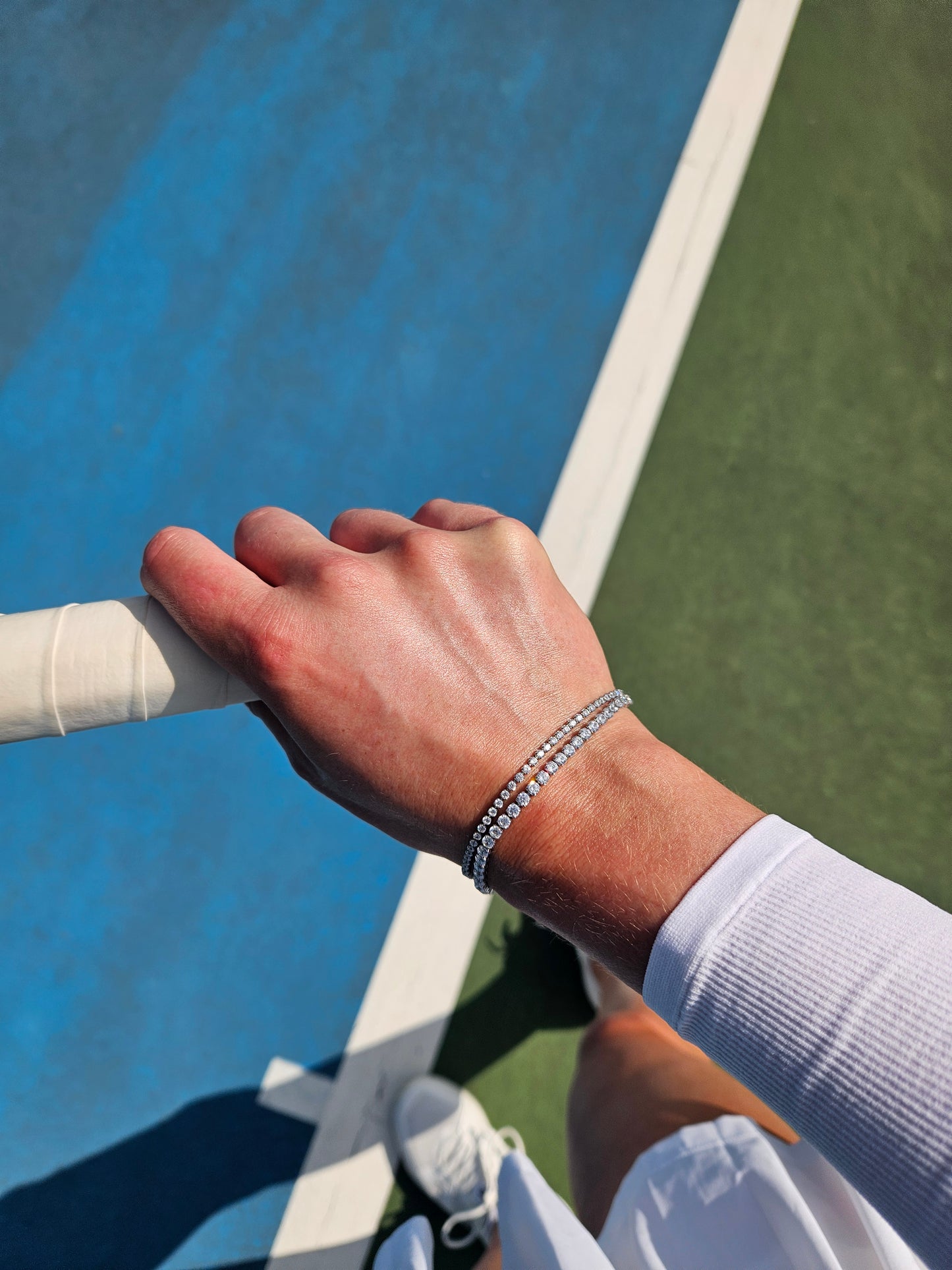 tennis bracelet racquet view